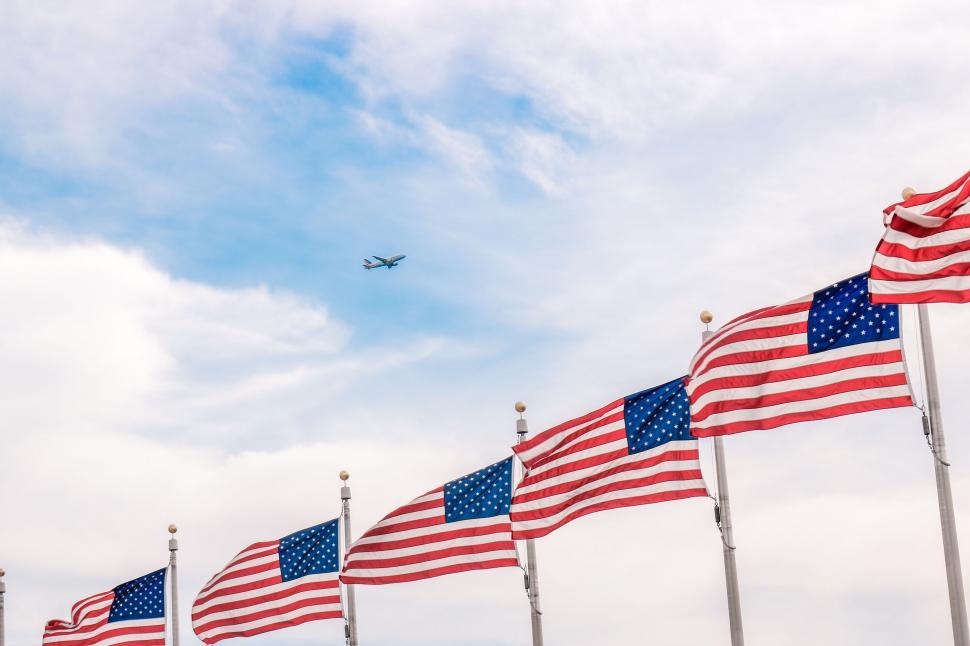 Free Stock Photo of American Flags and Airplane with Sky | Download