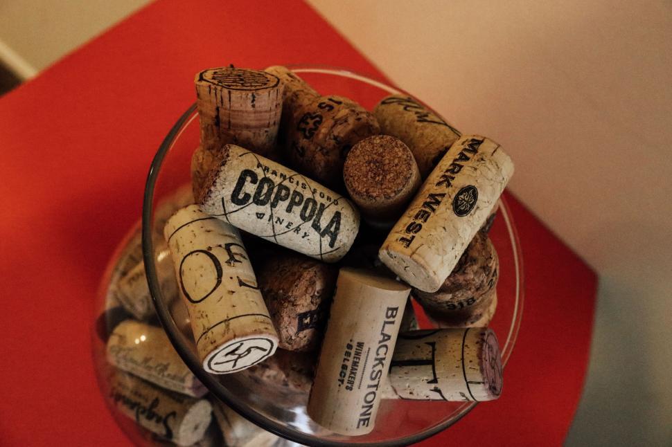 Free Stock Photo of Wine corks in glass container Download Free