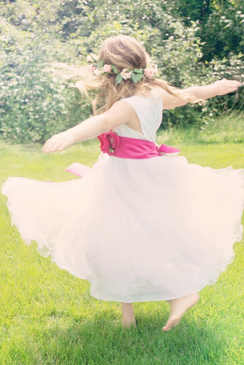 Free Stock Photo of Little Girl dancing in the park Download Free