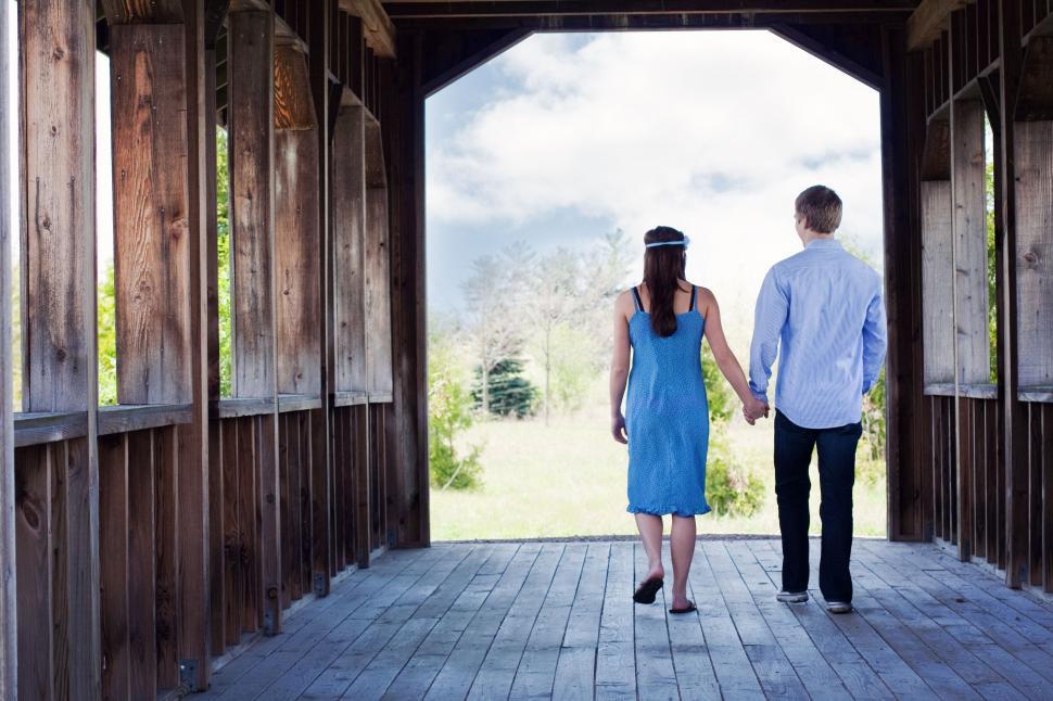 Free Image of Back View of Couple on Bridge  