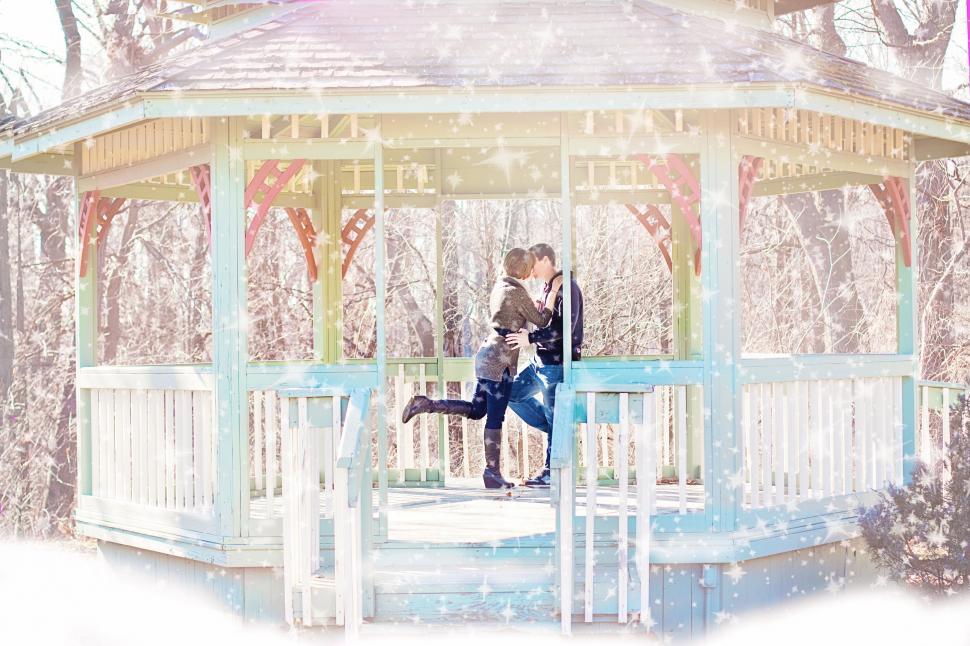 Free Image of Couple Kissing in Gazebo 
