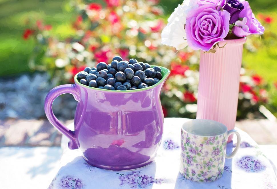 Blueberries and purple flowers