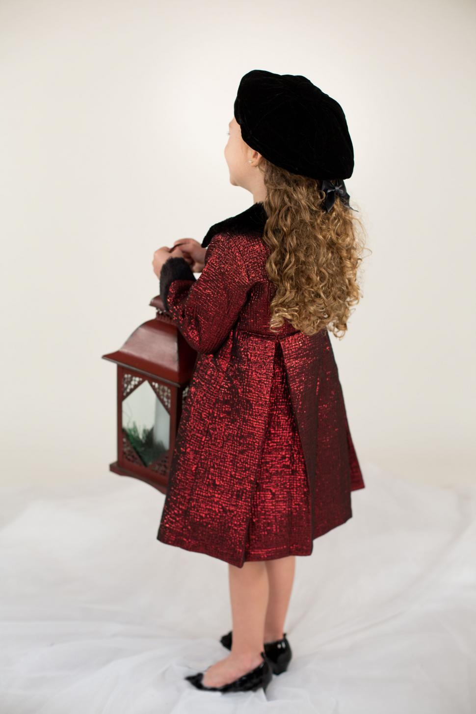 Free Stock Photo of Little girl in red sequin jacket with black cap