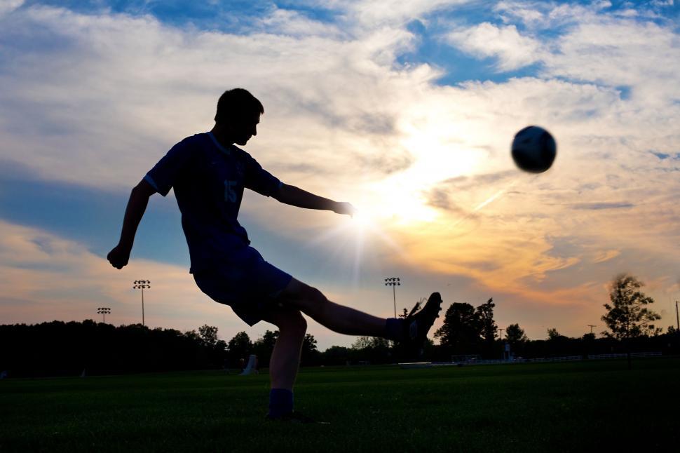 Free Stock Photo Of Boy Playing Football In The Sunset Download Free Images And Free Illustrations