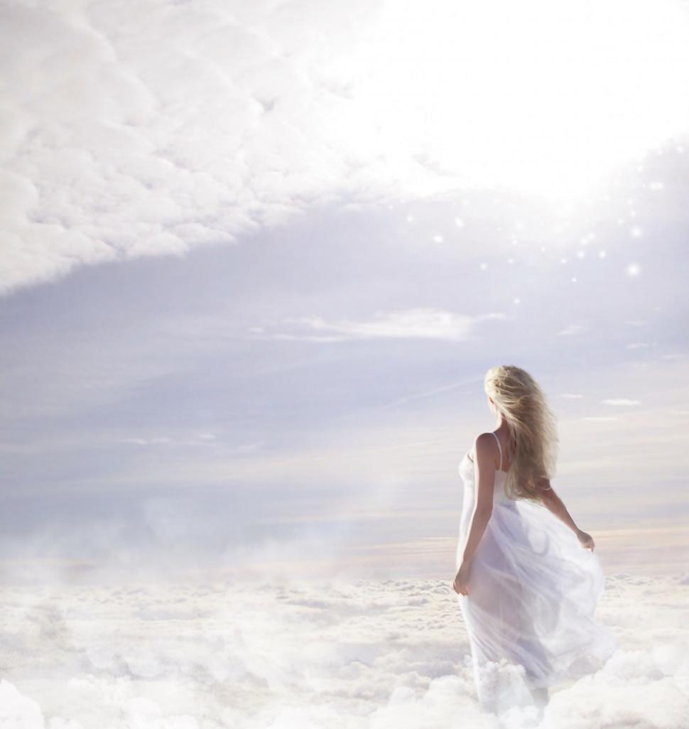 Free Image of Blonde Woman And Clouds 