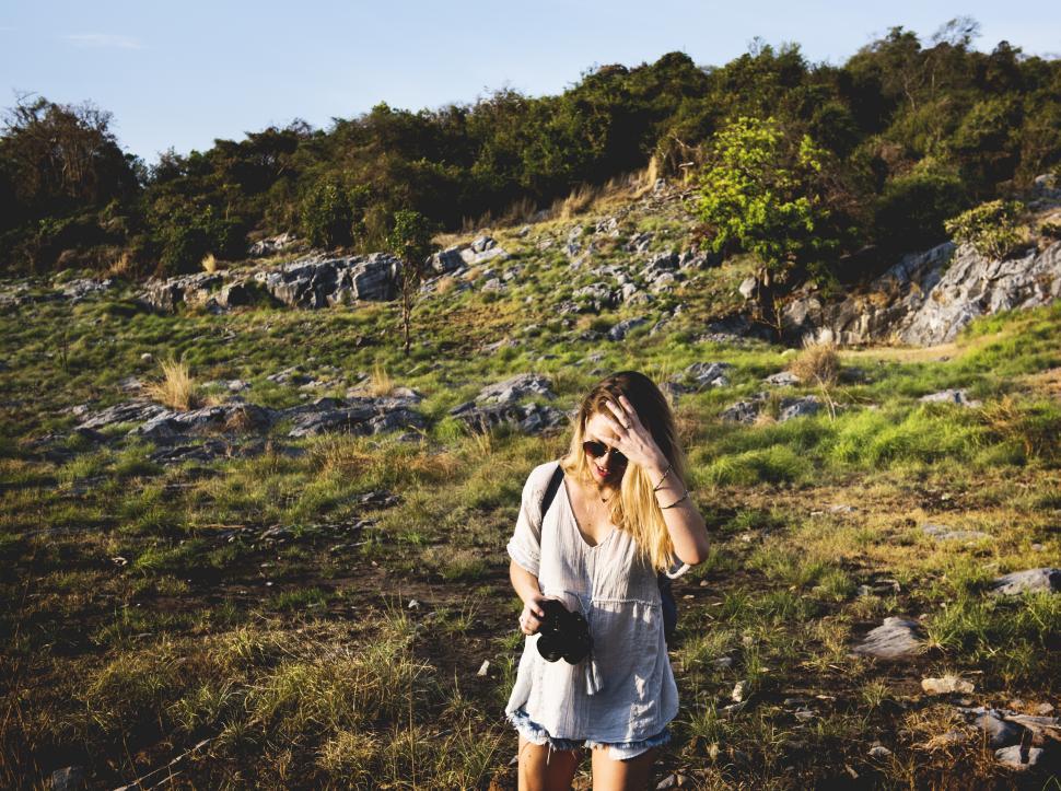 Free Image of A young hiker on a trail in the forest 