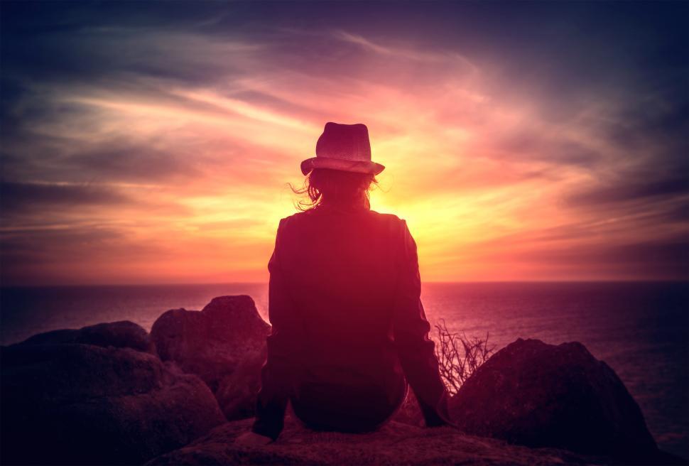 Free Stock Photo of Woman Watching the Sunset on Rocky Shore | Download ...