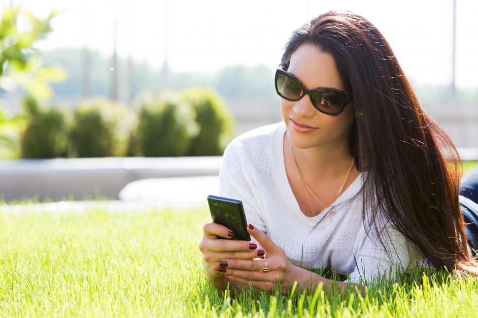 Free Image of Beautiful woman on the grass 