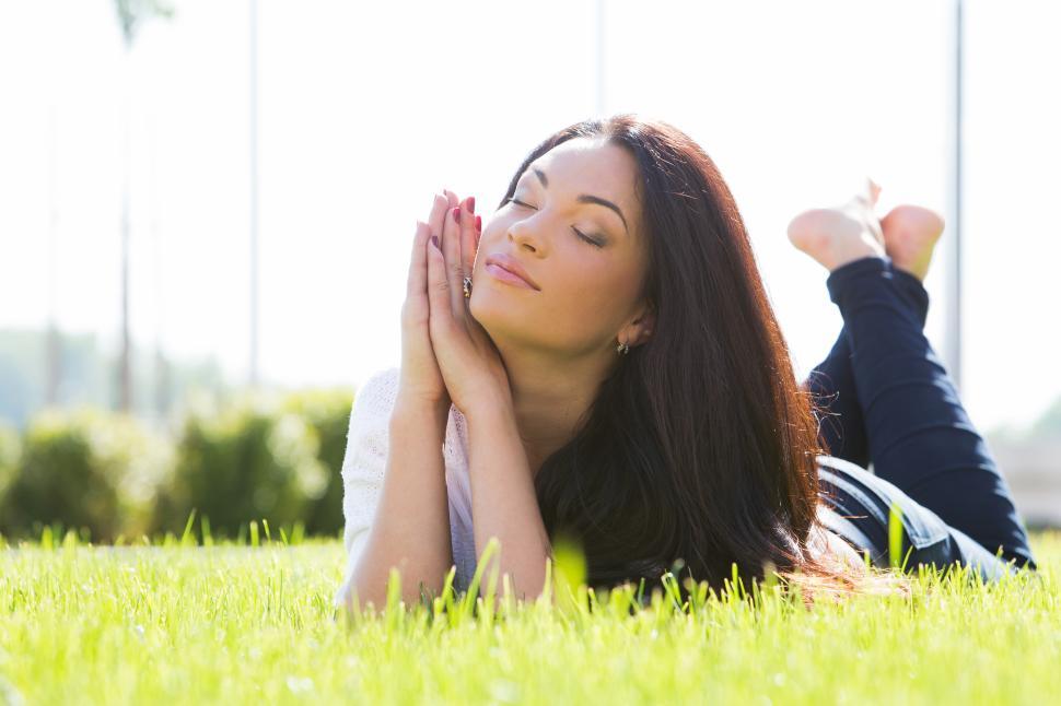 Free Image of Beautiful woman enjoying the grass 