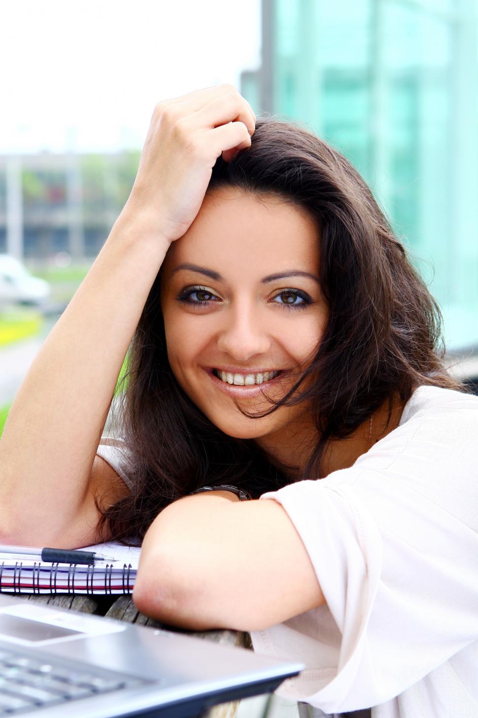 Free Image of Attractive woman working outdoors 