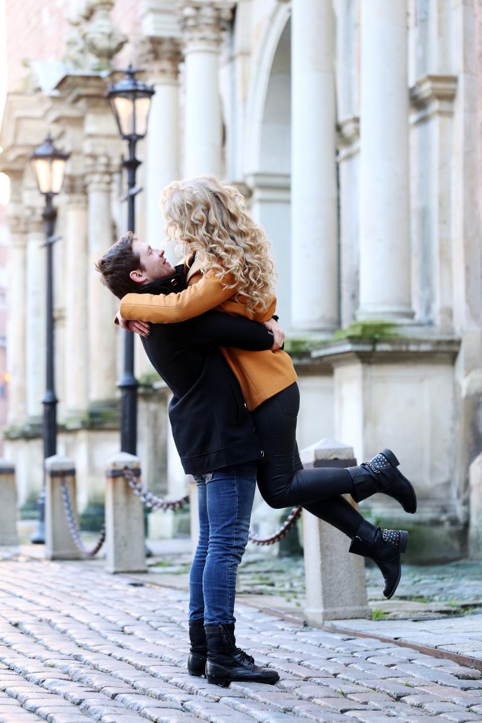Free Image of Joyful couple on the street 