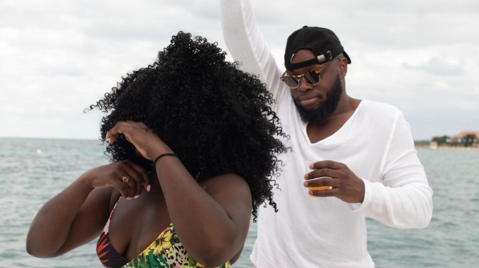 Free Image of Man and Woman Dancing on Boat 