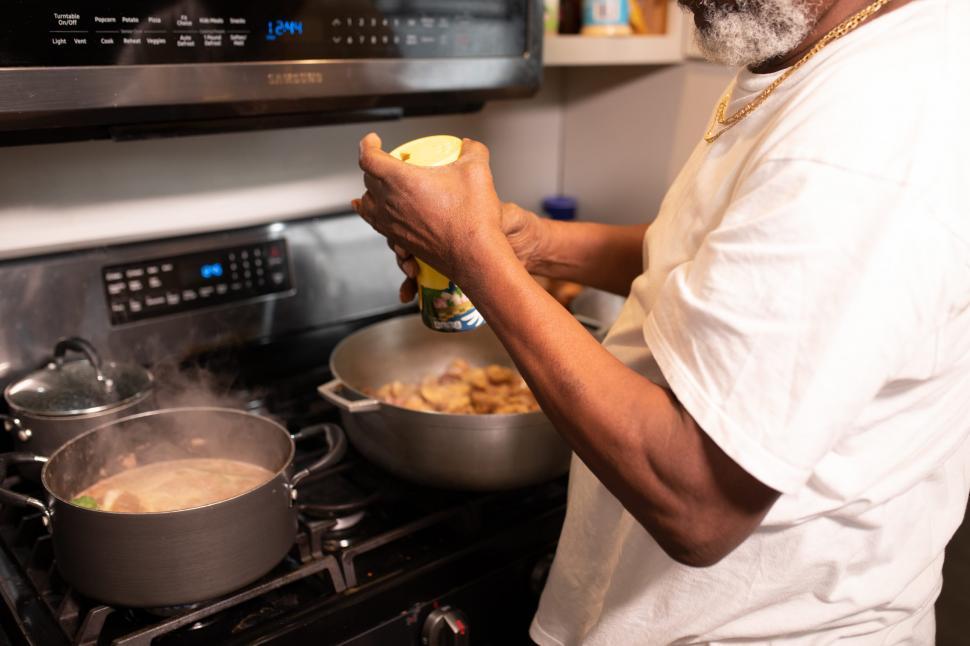 black man cooking