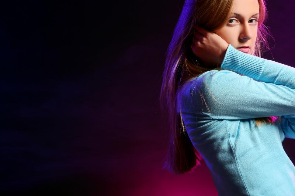 Free Image of beautiful young girl dark background frame edge 