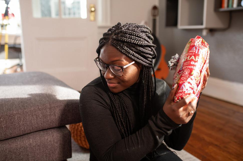 Free Image of Young Woman With Xmas Gift 