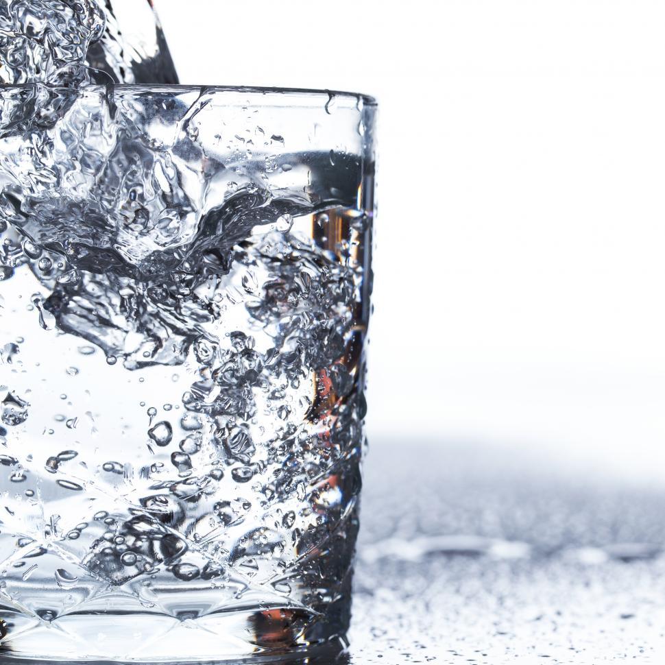 Free Image of Glass on the table filling with water 
