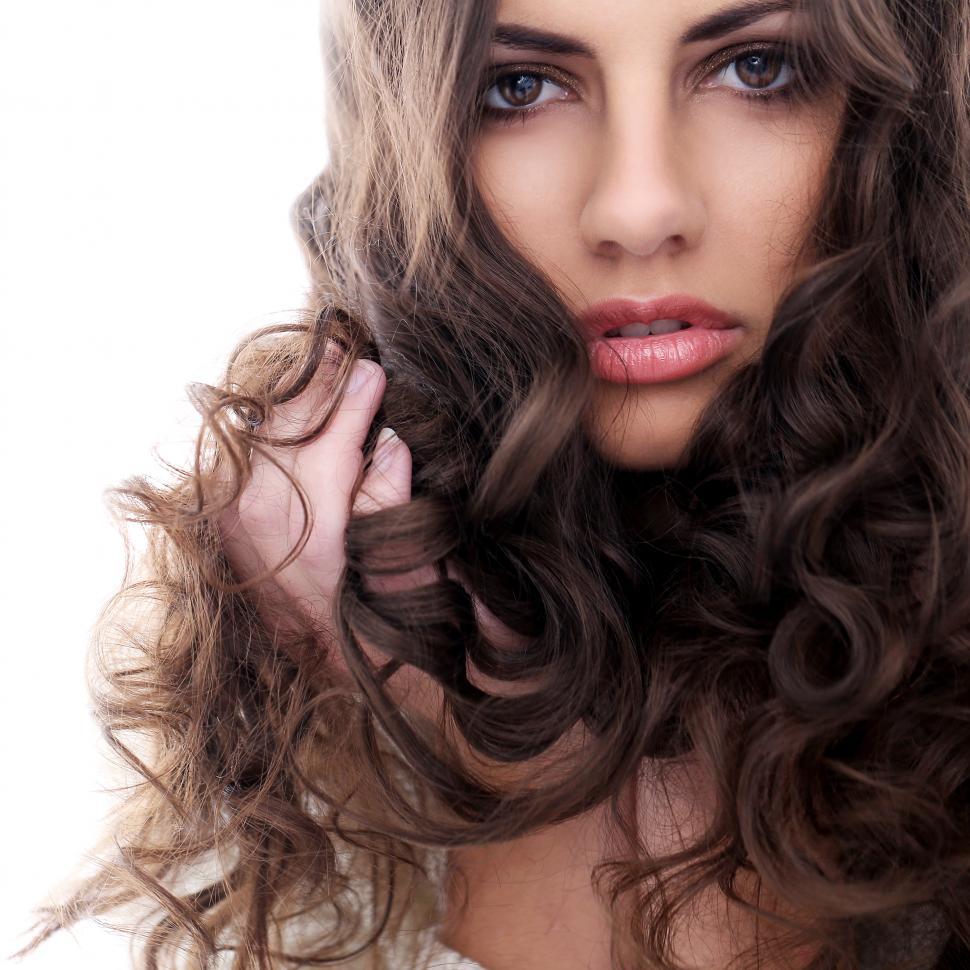 Free Image of Woman with dark hair on a white background 