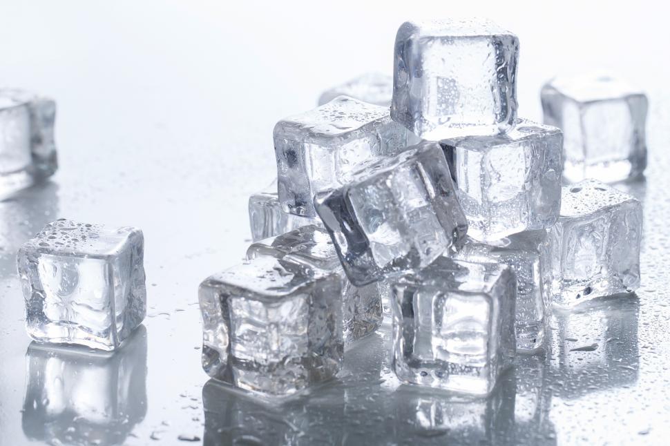 Big Ice Cube In Ice Tongs Over The Bucket On The Table Stock Photo -  Download Image Now - iStock