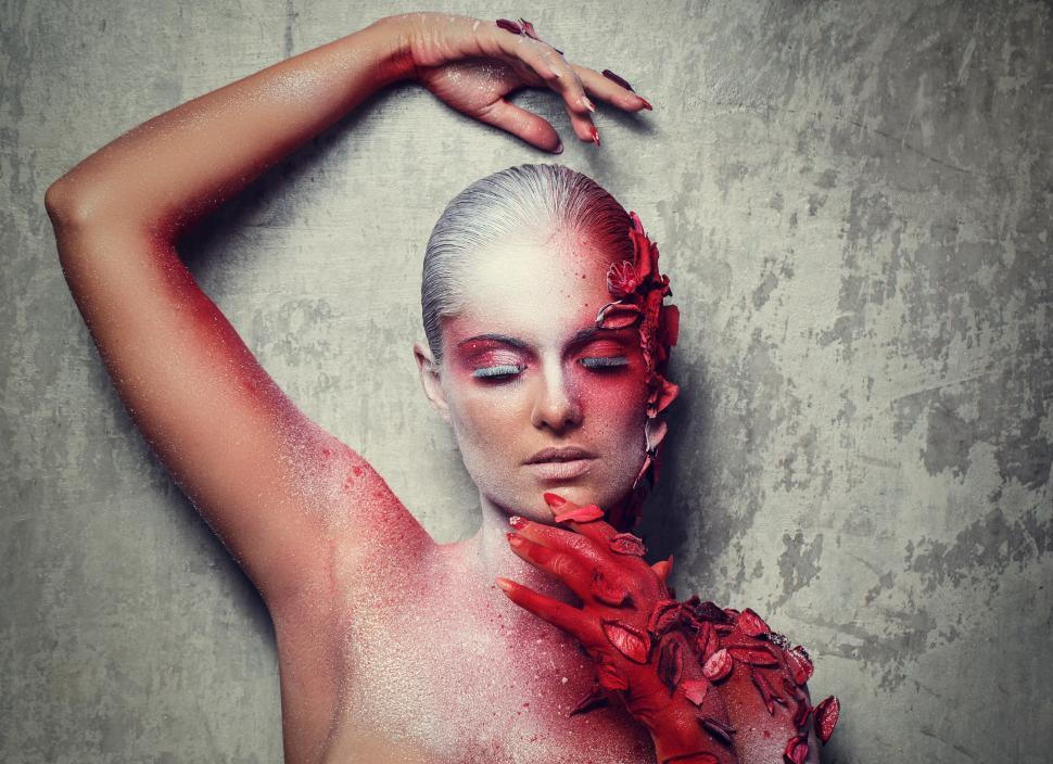 Free Image of Exotic, artistic red and white makeup 