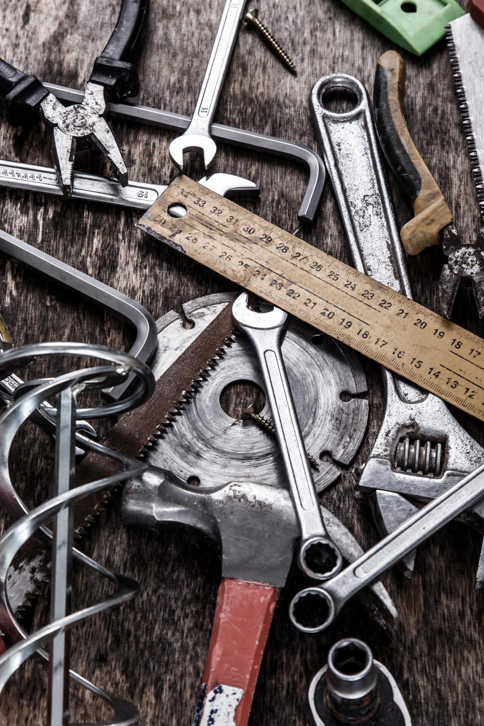 Scrapbooking Supplies And Tools Scattered On Table Stock Photo