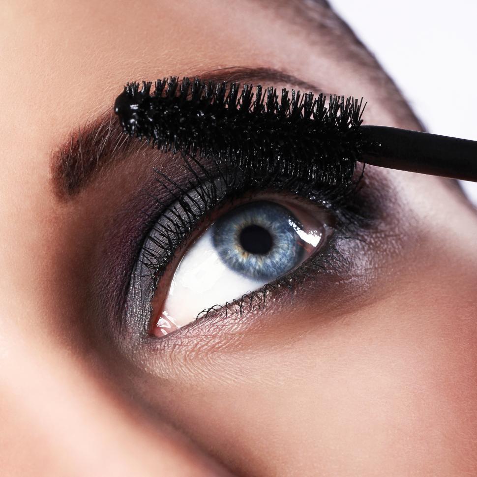 Free Stock Photo of Woman applying eye makeup, mascara Download Free