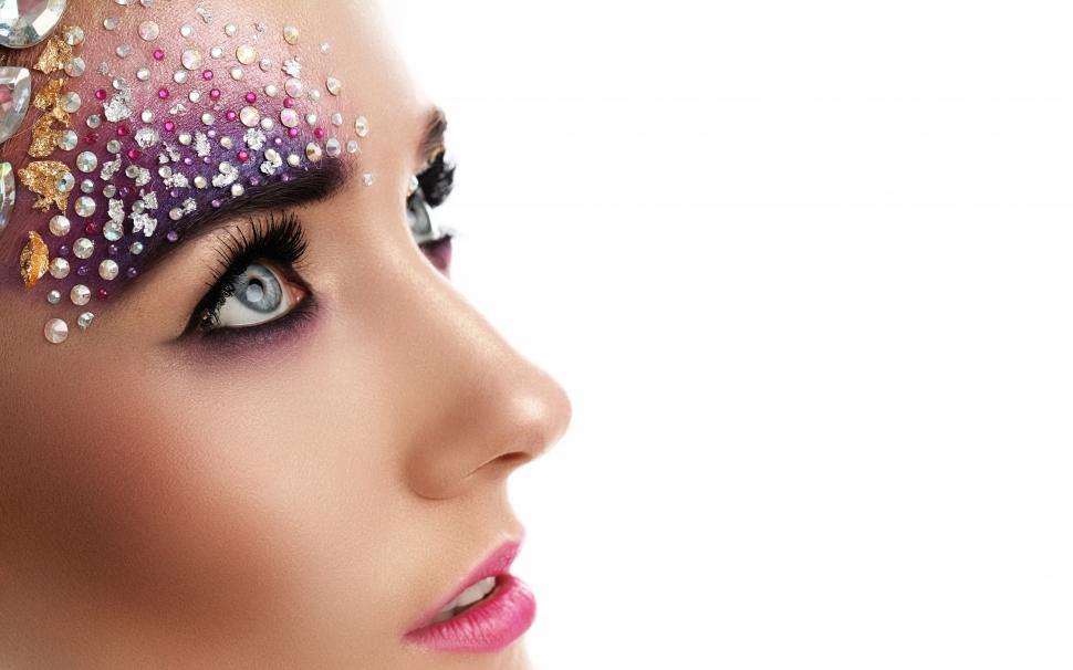 Free Image of Woman with glittery stones and artistic make-up 