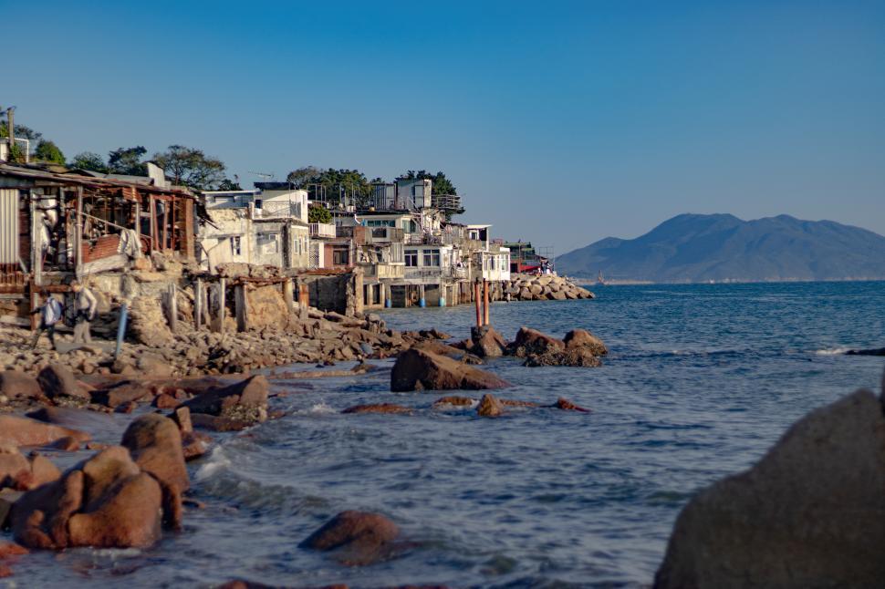 Free Image of Rocky Shoreline Next to Water 