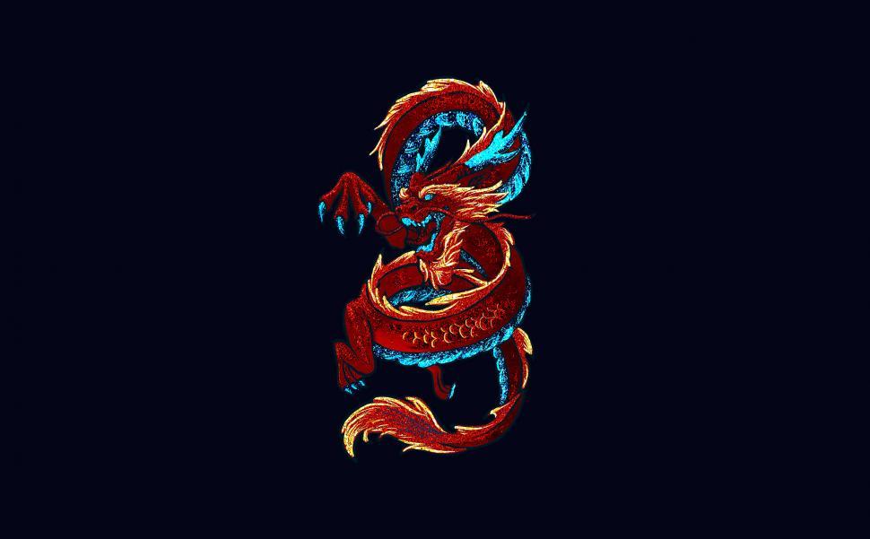 Download A Red And Blue Dragon With Feathers Wallpaper