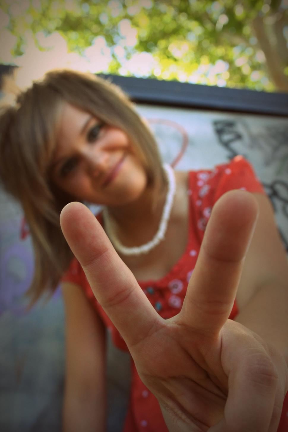 Free Image of Woman with victory sign 