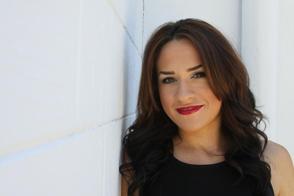 Free Image of Female fashion model with red lips and brunette hair - looking a 