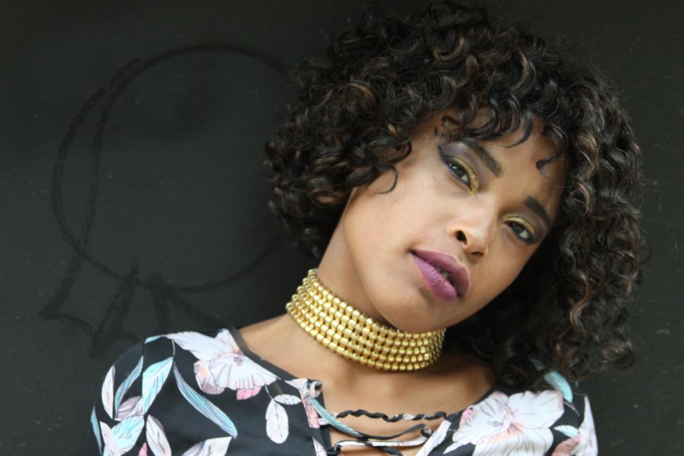 Free Image of Female fashion model with necklace - looking at camera 
