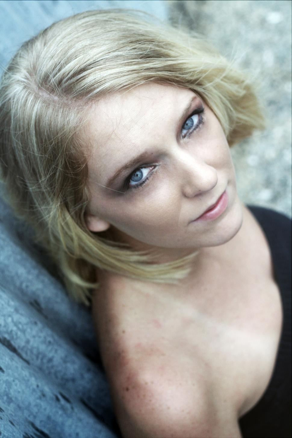 Free Image of Female fashion model posing and looking up at camera 