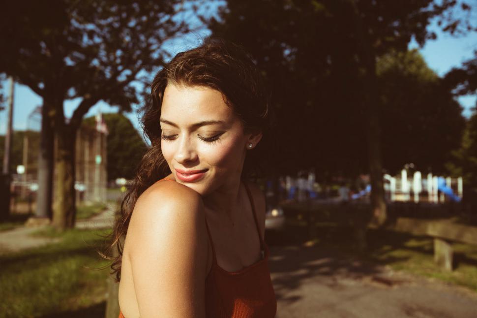 Free Image of Smiling woman in the park 