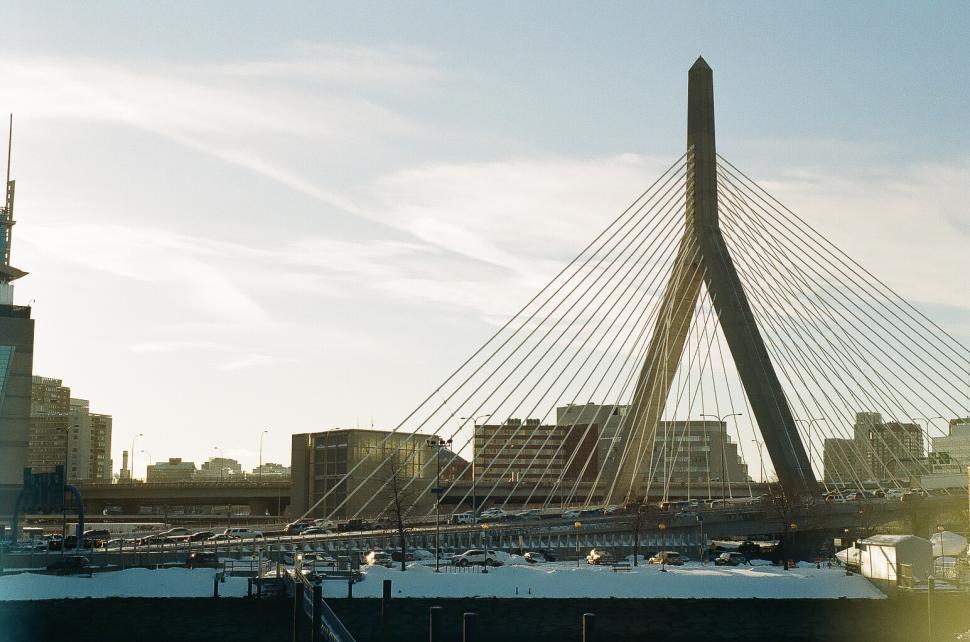 Free Image of Cable bridge and cars with snow 