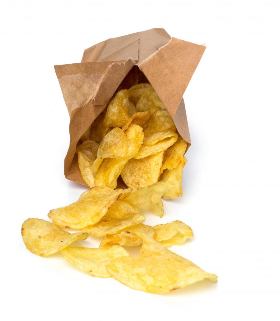 French fries in a brown paper bag isolated on a white background Stock  Photo