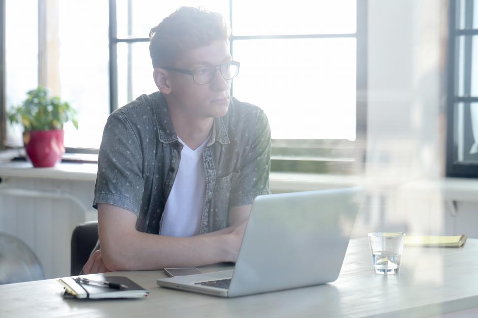 Free Image of Man in the office in the morning sun 