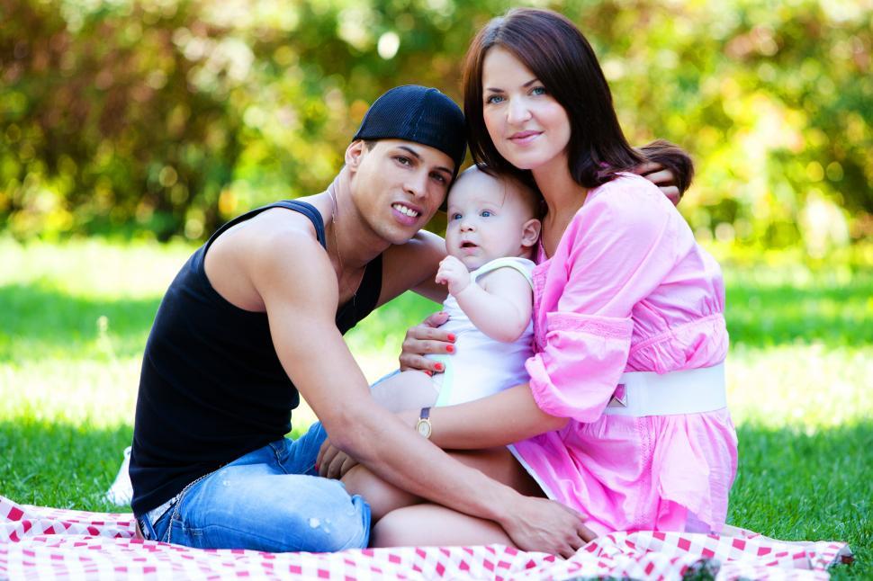 Free Image of Family relaxing in park at summer day 