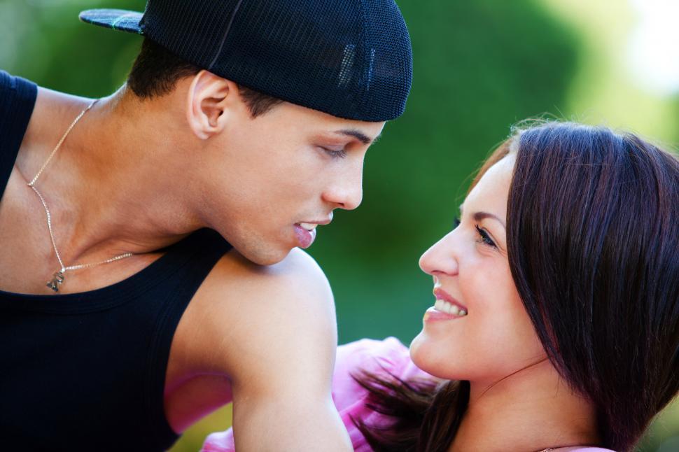 Free Image of Happy couple relaxing in the park 