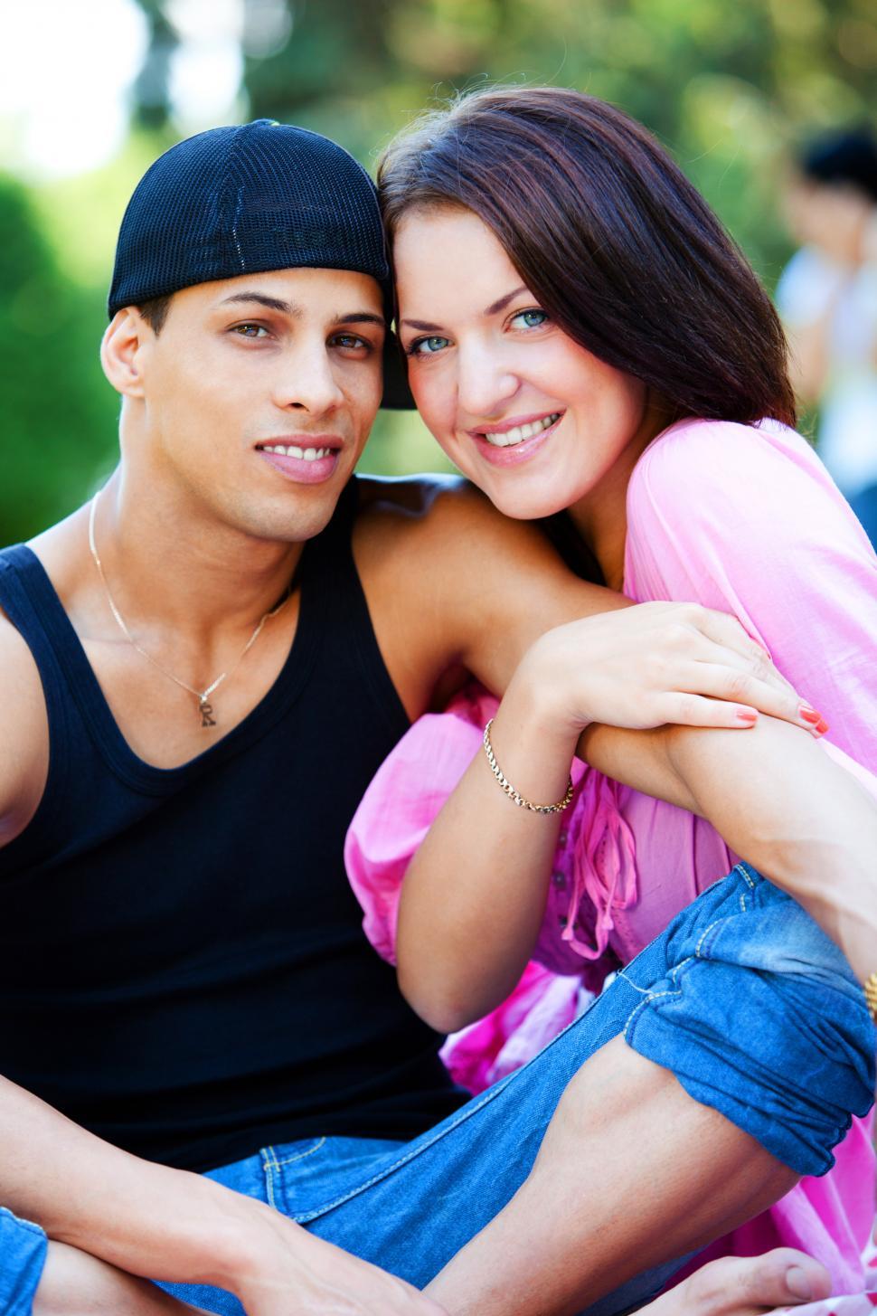 Free Image of Happy couple relaxing together in the park 