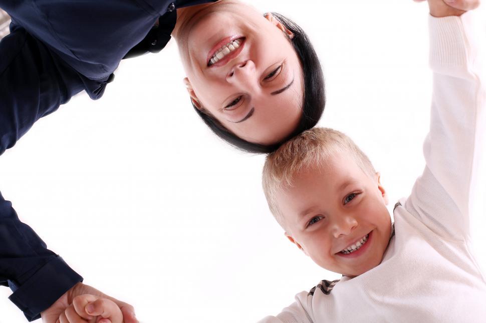 Free Image of Mother and child with heads together, looking down 