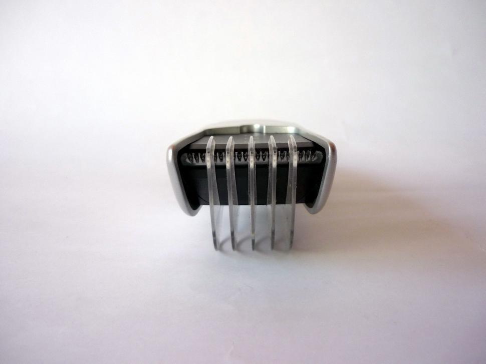 Close Up of a Comb on a White Surface
