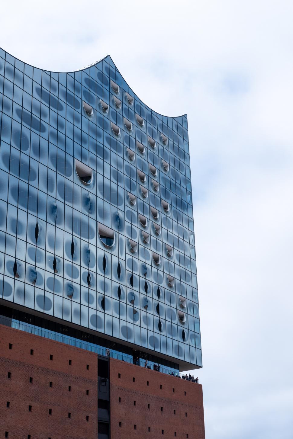 Free Image of Glass building and cloudy sky 