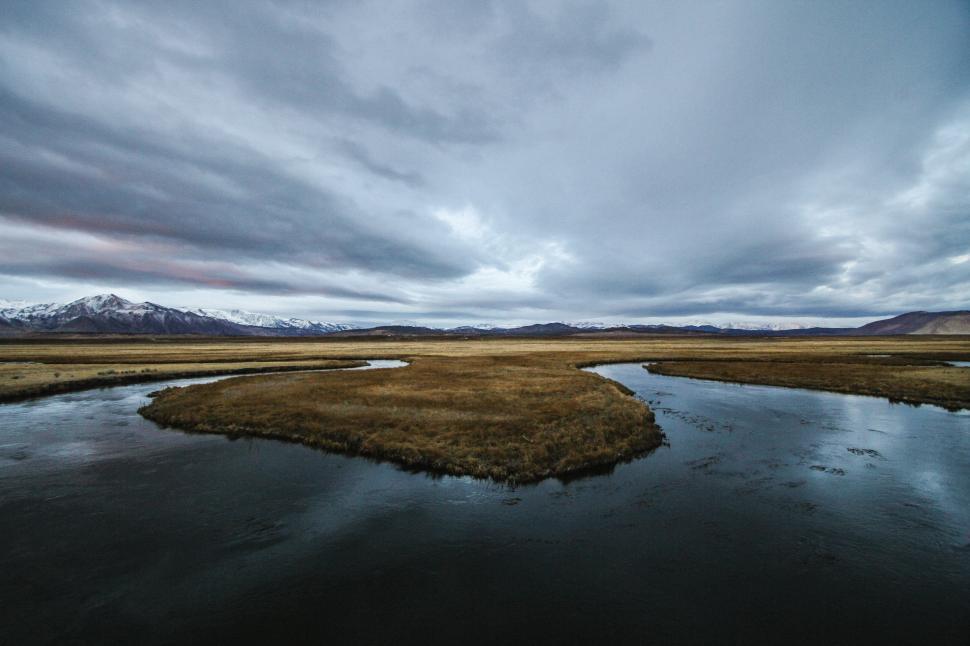 Free Image of Lake and meadows with mountains 