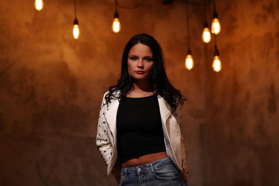 Free Image of Woman posing in empty room 
