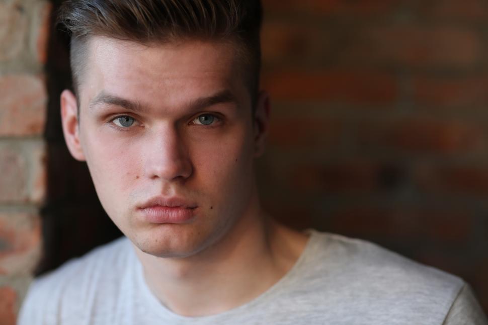 Free Image of Young guy looking at the camera 