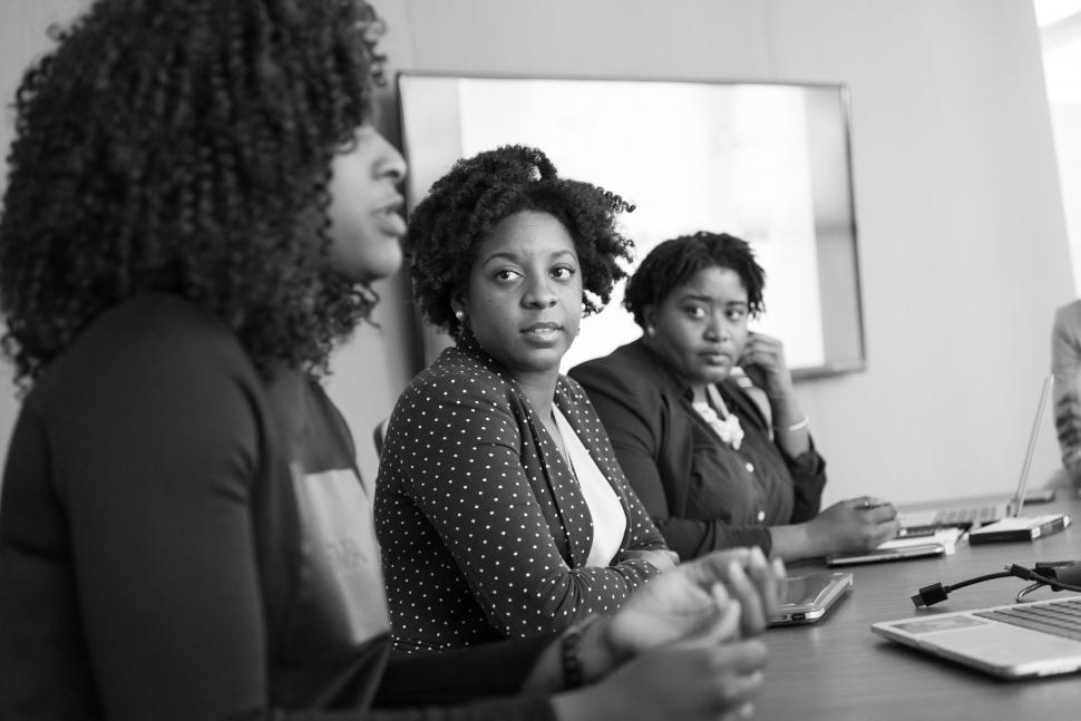 Free Image of Businesswomen working together in meeting room - b&w 