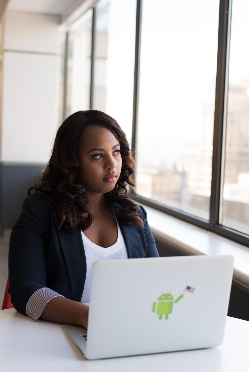 Free Image of Businesswoman with laptop at the desk in office 