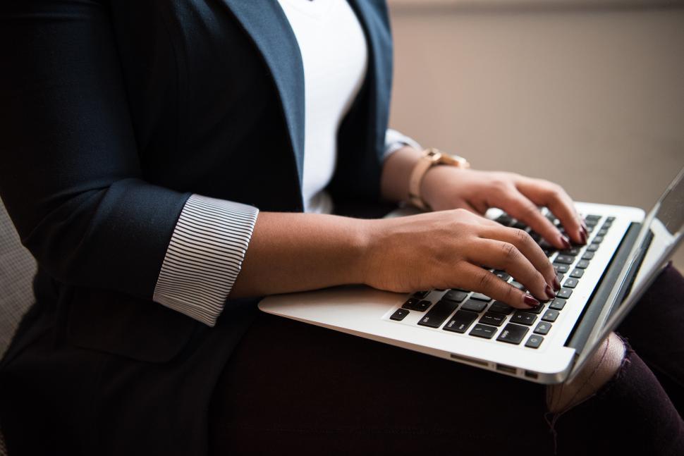 Free Image of Female hands typing on laptop 