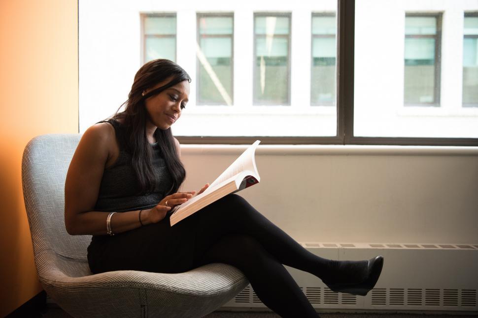 Free Image of Woman with book 