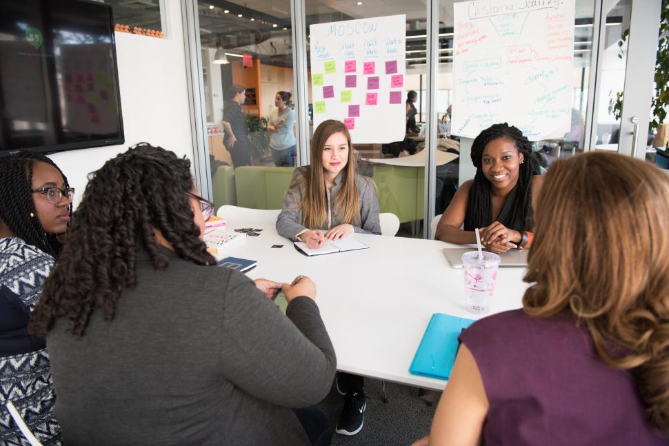 Free Image of Businesswomen discussing a plan in meeting room 
